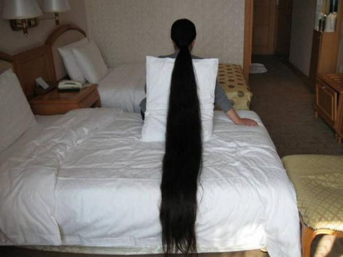 Οι γυναίκες με τα πιο μακριά μαλλιά στον κόσμο (pics) - Φωτογραφία 26