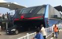 Δες το πρώτο λεωφορείο που περνάει πάνω από τα αυτοκίνητα στους δρόμους της πόλης Qinhuangdao στην Κίνα!! (ΒΙΝΤΕΟ)