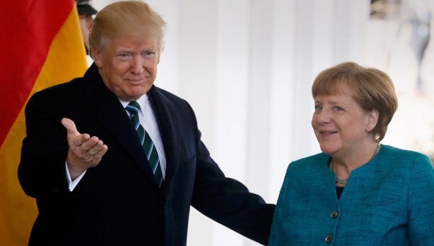 Σύγκρουση Μέρκελ- Τραμπ για το γερμανικό εμπορικό πλεόνασμα - Φωτογραφία 1