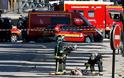 Συναγερμός στο Παρίσι - Εικόνες σοκ: Νεκρός στον δρόμο ο δράστης - Οπλοστάσιο το αμάξι του - Φωτογραφία 3