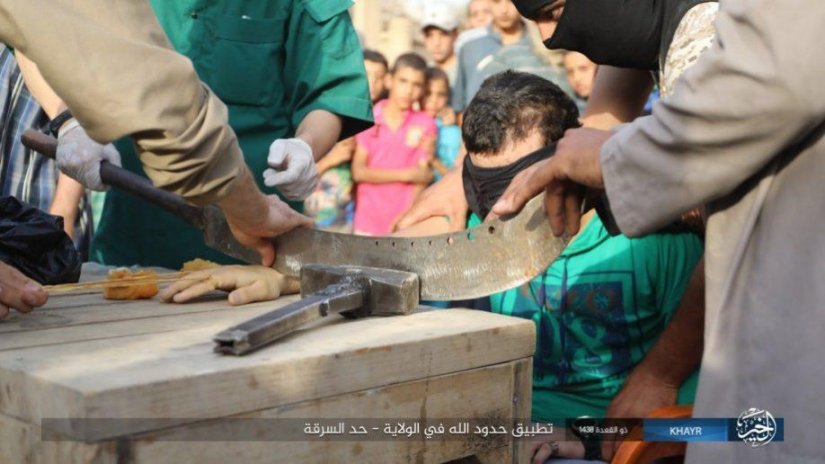 ISIS:Αυτά θα πάθετε άπιστοι απο εμάς τους εκλεκτούς του Αλλάχ (εικόνες) - Φωτογραφία 7