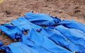 Φρίκη στη Συρία: Ανακαλύφθηκαν δεκάδες πτώματα σε γήπεδο ποδοσφαίρου  [photos] - Φωτογραφία 2