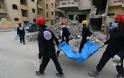 Φρίκη στη Συρία: Ανακαλύφθηκαν δεκάδες πτώματα σε γήπεδο ποδοσφαίρου  [photos] - Φωτογραφία 3