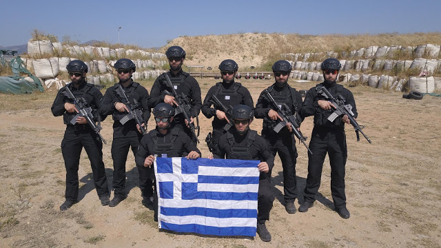 Κράτησε ψηλά την Ελληνική σημαία η Ε.Κ.Α.Μ. (φωτογραφίες) - Φωτογραφία 1