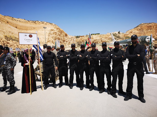 Κράτησε ψηλά την Ελληνική σημαία η Ε.Κ.Α.Μ. (φωτογραφίες) - Φωτογραφία 2