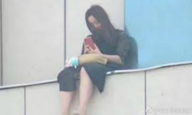 Κτηνωδία στην Κίνα: Πλήθος φώναζε σε κοπέλα Πήδα από τον 8ο όροφο. - Φωτογραφία 1