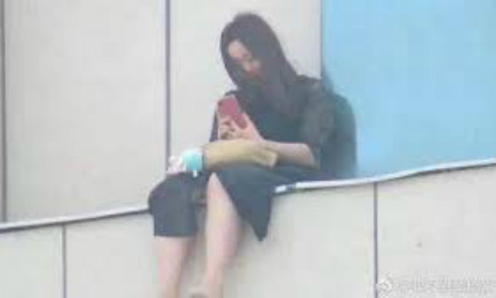 Κτηνωδία στην Κίνα: Πλήθος φώναζε σε κοπέλα Πήδα από τον 8ο όροφο. - Φωτογραφία 3