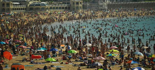 Το κύμα καύσωνα σαρώνει την Ευρώπη -46 βαθμοί στην Πορτογαλία, 3 νεκροί - Φωτογραφία 1