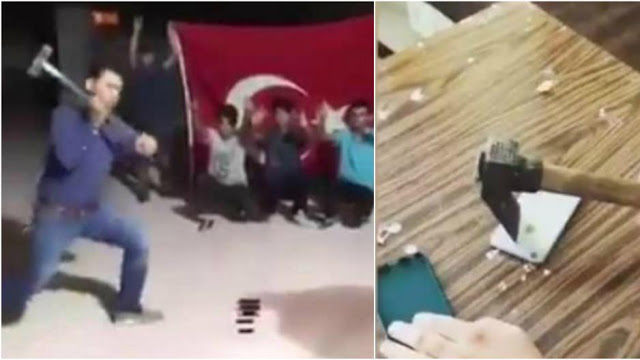 Αντίποινα Τούρκων κατά ΗΠΑ: Οπαδοί του Ερντογάν καταστρέφουν iphone με σφυριά, βαριοπούλες αλλά και...πιστόλια - Βίντεο - Φωτογραφία 1