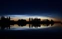 Noctilucent Clouds, Reflections, and Silhouettes