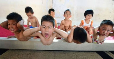 Προπόνηση ή βασανιστήρια: Στα άδυτα των παιδικών γυμναστηρίων της Κίνας (εικόνες) - Φωτογραφία 1