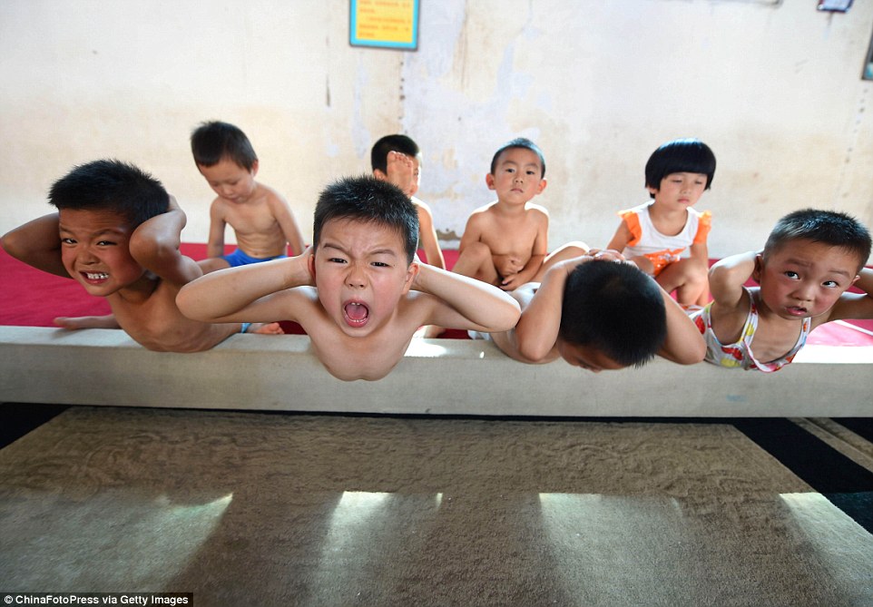 Προπόνηση ή βασανιστήρια: Στα άδυτα των παιδικών γυμναστηρίων της Κίνας (εικόνες) - Φωτογραφία 8