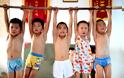 Προπόνηση ή βασανιστήρια: Στα άδυτα των παιδικών γυμναστηρίων της Κίνας (εικόνες) - Φωτογραφία 2