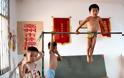 Προπόνηση ή βασανιστήρια: Στα άδυτα των παιδικών γυμναστηρίων της Κίνας (εικόνες) - Φωτογραφία 5