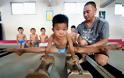 Προπόνηση ή βασανιστήρια: Στα άδυτα των παιδικών γυμναστηρίων της Κίνας (εικόνες) - Φωτογραφία 6