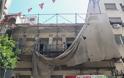 Φωτογραφικό οδοιπορικό μετά τα 5,1 Ρίχτερ: Έπεσαν παλιά κτίρια, κατέρρευσε ο ταινιόδρομος στον Πειραιά - Φωτογραφία 6
