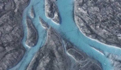 Λιώνει η Γροιλανδία: 22 βαθμοί και ποτάμια πάγου - Φωτογραφία 1