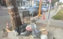 Ασυνείδητοι πετάνε σκουπίδια σε σταυροδρόμι σε δημόσια θέα - εικόνες - Φωτογραφία 1