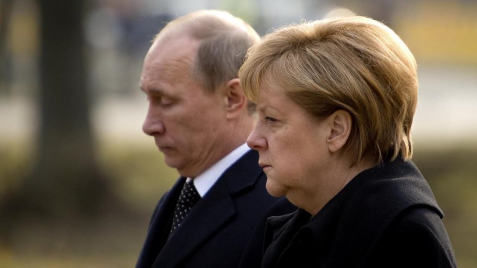 Πούτιν και Μέρκελ συμφώνησαν να δοθεί ειδικό καθεστώς στον Ντονμπάς - Φωτογραφία 1