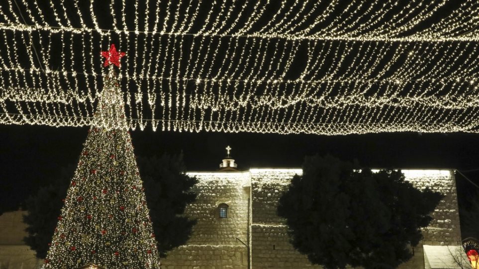 Βηθλεέμ: Χιλιάδες Χριστιανοί γιορτάζουν τα Χριστούγεννα στη Δυτικη Όχθη - Φωτογραφία 1