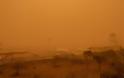 Απόκοσμες εικόνες στα Κανάρια Νησιά: «Κόκκινος» ο ουρανός από την αφρικανική σκόνη - Φωτογραφία 1