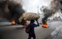 Αϊτή: Παρέλυσε χθες η πρωτεύουσα μετά τα αιματηρά επεισόδια μεταξύ αστυνομικών και στρατιωτικών - Φωτογραφία 4