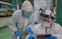 Μαύρο... έγινε το δέρμα δύο Κινέζων γιατρών που νόσησαν από τον ιό - Φωτογραφία 1