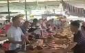 Δεν βάζουν μυαλό. Ανοιξαν ξανά στην Κίνα το φεστιβάλ κρέατος σκύλων. Τρώνε και γάτες (video) - Φωτογραφία 4