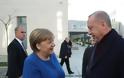 «Το προστατευτικό χέρι της Γερμανίας πάνω από τον Ερντογάν» γράφει σημερινό δημοσίευμα της Welt
