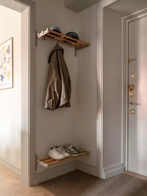 ΜΙΚΡΟΙ ΧΩΡΟΙ: Εξαιρετική αισθητική και πρακτικές λύσεις αποθήκευσης σε 34τμ - Φωτογραφία 2