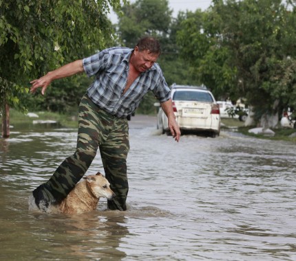 Πένθος και καταστροφή στη Ρωσία από τις πλημμύρες - Φωτογραφία 3