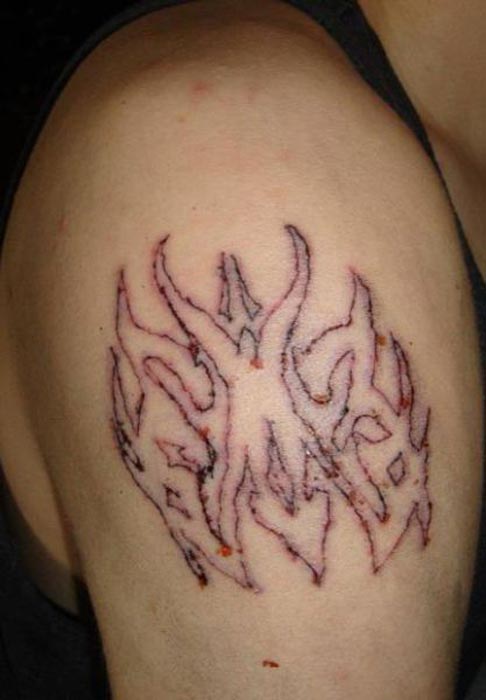 ΔΕΙΤΕ: Ίσως ο χειρότερος τατουατζής του κόσμου… - Φωτογραφία 14