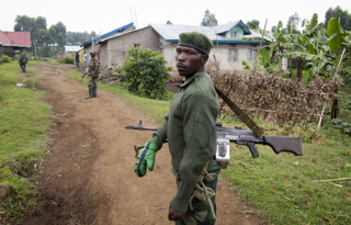 Αναστέλλουν τη βοήθεια στη Ρουάντα - Φωτογραφία 1