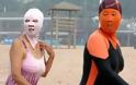 ΔΕΙΤΕ: Μασκοφόροι Κινέζοι κατακλύζουν τις παραλίες