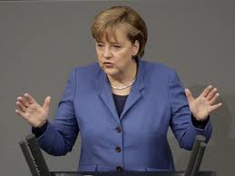 Μέρκελ: «Απόλυτη πολιτική βούληση» για σταθερό ευρώ - Φωτογραφία 1