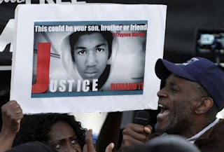 Να χυθεί άπλετο φως στη δολοφονία νεαρού Αφροαμερικανού ζητά ο Ομπάμα - Φωτογραφία 1