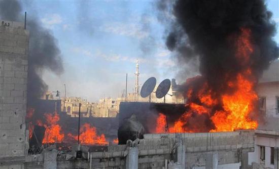 Συνεχίζονται οι βομβαρδισμοί στη Χομς - Φωτογραφία 1