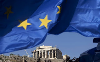 Ο Μόντι τονίζει ότι «η Ελλάδα πρέπει να παραμείνει στο Ευρώ» - Φωτογραφία 1