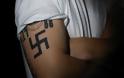 Οι κώδικες μίσους της Χρυσής Αυγής  - Τι σημαίνουν τα τατουάζ τους
