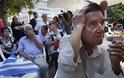 Εικόνες μιας Ελλάδας σε κρίση στο φακό του Reuters… - Φωτογραφία 11