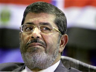 Αίγυπτος: Ο πρόεδρος Μόρσι κηρύσσει τρεις πόλεις σε κατάσταση έκτακτης ανάγκης - Φωτογραφία 1
