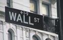 Έπεσε η Wall Street λόγω των διαφωνιών στη Fed για το τύπωμα χρήματος