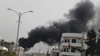 Βομβαρδισμός συνοικίας της Χομς από μαχητικά - Φωτογραφία 1
