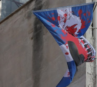 Δείτε τη σημαία που κρέμασε ο Δημήτρης Κολλάτος - Τι λέει για το περιστατικό μέσα από το κρατητήριο - Φωτογραφία 1