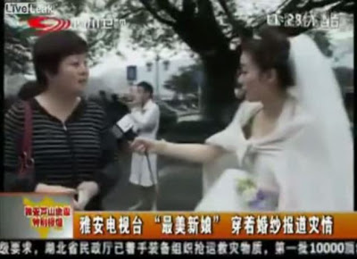 ΑΠΙΣΤΕΥΤΟ: Παρουσιάστρια παράτησε τον γάμο για να κάνει ρεπορτάζ για τον σεισμό στην Κίνα! [video] - Φωτογραφία 2