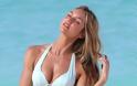 Η Candice Swanepoel είναι υπέροχη με λευκό μπικίνι στην παραλία - Φωτογραφία 5