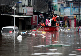 Κίνα: Δεκάδες νεκροί από τις πλημμύρες - Φωτογραφία 1