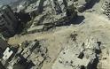 Αεροφωτογραφίες δείχνουν την πλήρη καταστροφή της Συριακής πόλης Χομς - Φωτογραφία 2