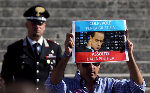 Ιταλία: Επικύρωση της ποινής Μπερλουσκόνι από το Ανώτατο Δικαστήριο - Φωτογραφία 1