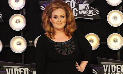 Η Adele πλουσιότερη κατά 14 εκατομμύρια λίρες - Φωτογραφία 1